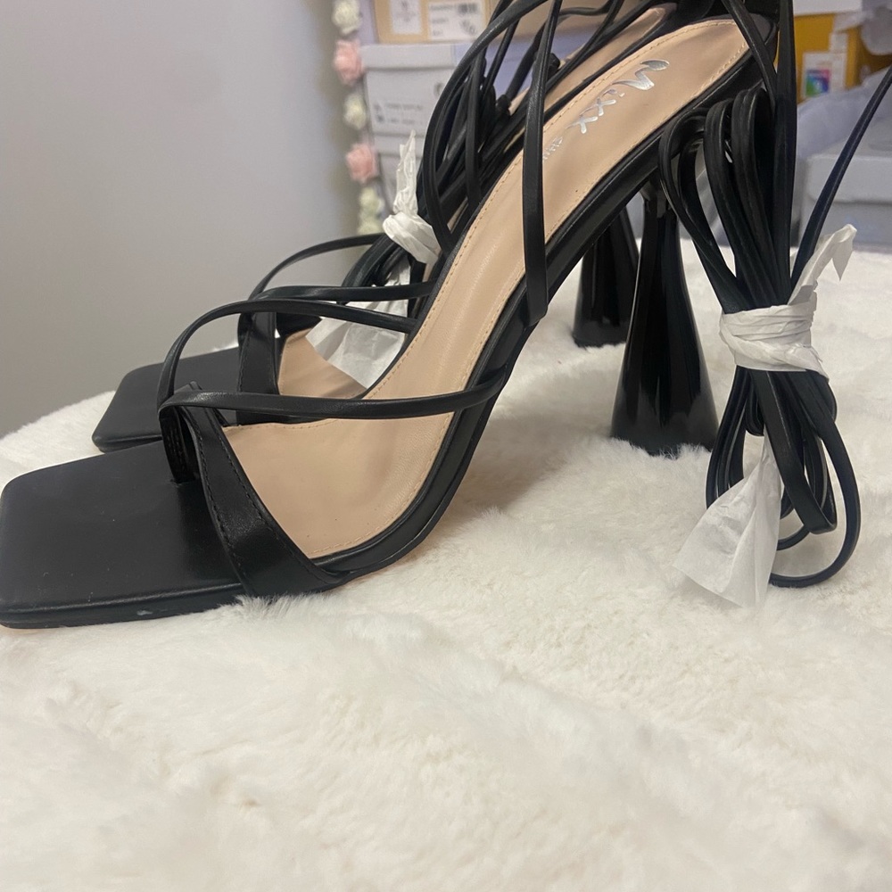 Cone shaped black heel